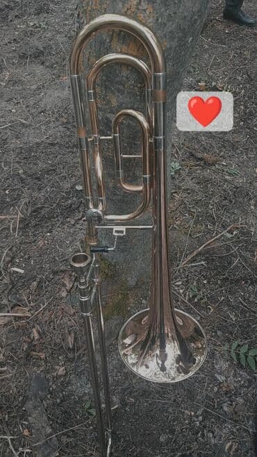 купить бу гитару: Bu, mis nəfəs alətləri qrupuna aid olan, sürüşmə mexanizmi sayəsində — 4