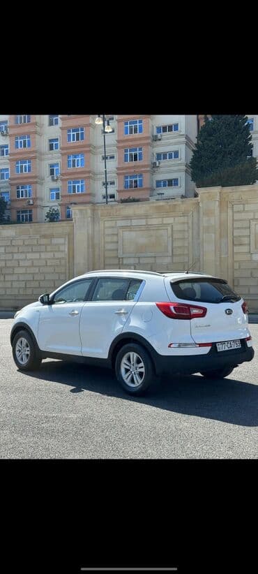 islenmis masinlar: Kia Sportage: 2 l | 2013 il Pikap — 4