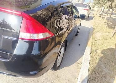 Honda Insight hibrid hetçbek satilir. Ili 2009.Mator 1.5 hibrid. - — 7