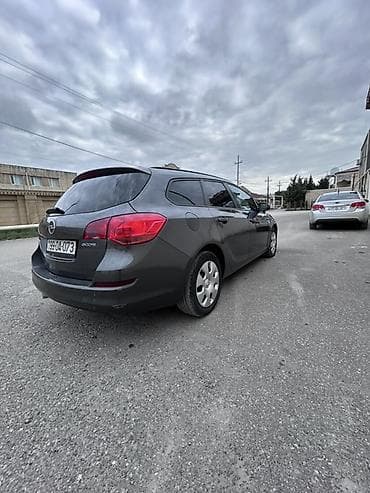 Nəqliyyat: Opel Astra: 1.3 l | 2011 il 410000 km Universal — 5