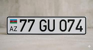 Nömrə nişanı: AZ 77 GU 074 - Format: yeni standart birsətirli dövlət