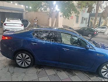 Продажа авто: Kia Optima SX T-GDI, mavi rəngli sedan. Xarici: - Parlaq mavi kuzov — 5