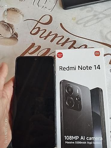 xiaomi ipad: Xiaomi 14, 256 GB, rəng - Qara, 
 Barmaq izi, Simsiz şarj — 2