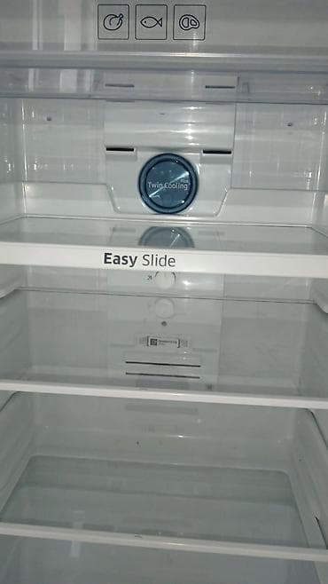 irşad soyuducu samsung: Məhsul: İki qapılı soyuducu (üst kamera dondurucu) Xüsusiyyətlər: - — 2