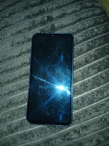 Smartfon - Tam ekranlı sensorlu displey, damla formalı ön kamera