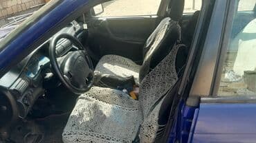 volkswagen jetta 1 4: Opel Astra F universal (kombi) – göy rəngli kuzov. Xüsusiyyətlər: - — 5