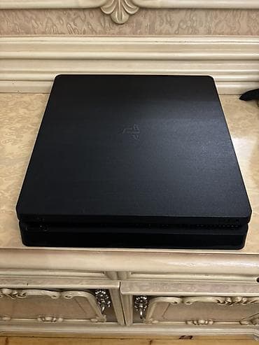 pleys: PlayStation 4 Slim oyun konsolu Xüsusiyyətlər: - Rəng: qara, yığcam — 2