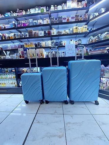 Səyahət çamadanları dəsti – 3 ölçü - Rəng: açıq mavi - Korpus: sərt və