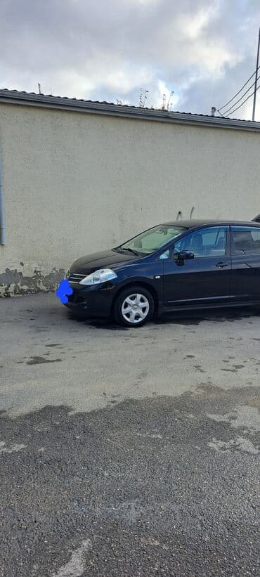 faizsiz kreditlə maşın: Nissan Tiida avtomobili hər gün rahat istifadə üçün nəzərdə tutulmuş — 4