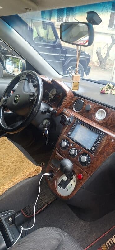 kvadrasikl satışı: Mitsubishi Airtrek Turbo – gümüşü rəngli, sport üslublu universaI/SUV — 7