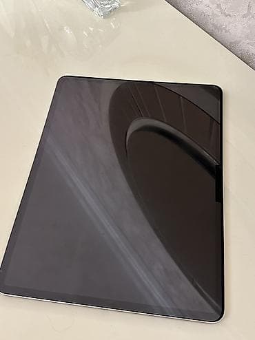 apple ipad: Qutusu var, 94% pil, dəyişilməyib. Üstündə adapter verilir, az — 1