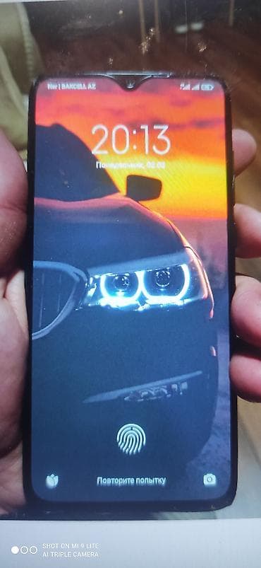 islemis telefonlarin satisi: Xiaomi Mi 9 Lite, rəng - Qara, 
 Barmaq izi — 6