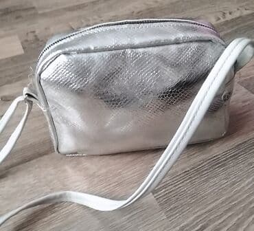 1 qram gumuşun qiyməti 2025: Yenidi gümüşü rengdi içində cibi var qulpu ayarlanir — 1