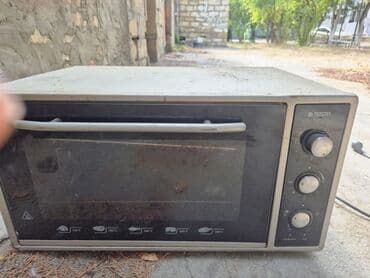 телескопическая вытяжка для кухни: Духовка Tesla, Электрическая, цвет - Черный — 1