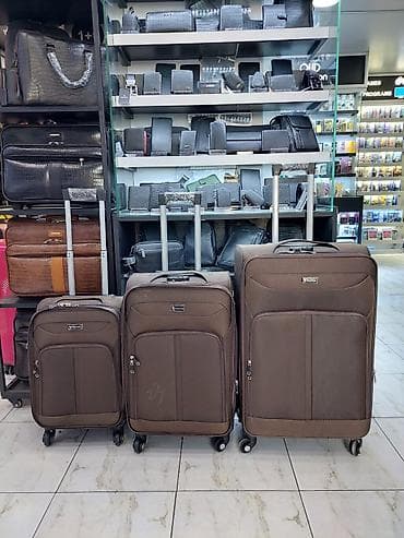 çamta: - Məhsul: Təkərli səfər çamadanları dəsti (3 ölçü) - Rəng: Tünd — 1