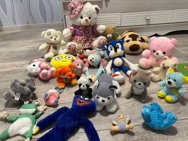 i̇nteraktiv oyuncaq itlər: Müxtəlif ölçülü və rəngli yumşaq, doldurulmuş oyuncaqlar dəsti. Dəstə — 1