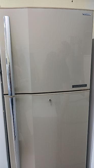Elektronika: İşlənmiş 2 qapılı Toshiba Soyuducu Satılır, rəng - Qızılı, Təkərli — 1