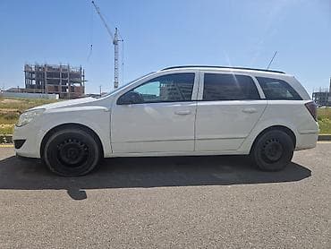 opel astra h rul: Opel Astra H Caravan (Universal), ağ rəng q Xüsusiyyətlər: - Kuzov — 4