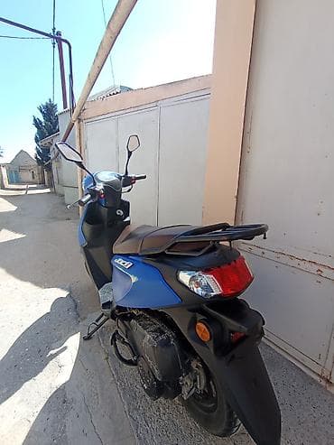 prado tekerleri type 1: Məhsul: JOG model skuter (mavi rəng) Xüsusiyyətlər: - Şəhər içi rahat — 3