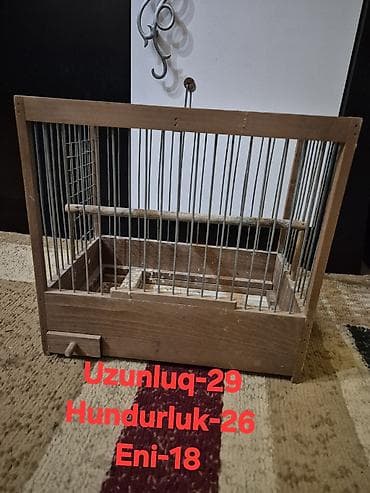 Taxta quş qəfəsi Ölçülər: - Uzunluq: 29 sm - Hündürlük: 26 sm - En — 1