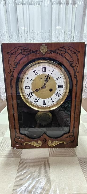 islenmis generator satisi: Divar saatları, Mexaniki, Mayatnik — 10