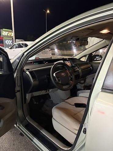 toyota prius kapot: Toyota Prius (2-ci nəsil) hibrid hetçbek - Gümüş/boz rəngli kuzov, 5 — 7