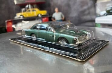 Avtomobil modelləri: Коллекционная модель Aston Martin DB4 Coupe British racing green — 7
