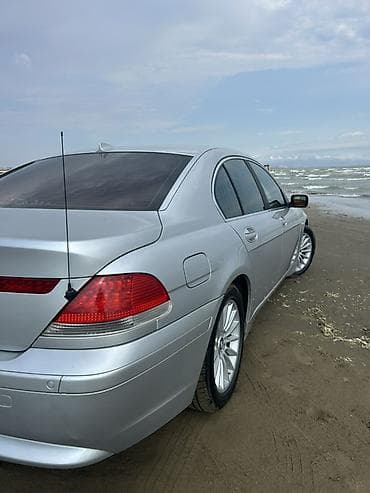 bmw e60 disk: BMW 735: 3.6 l | 2002 il Sedan — 7