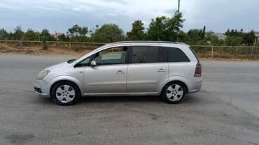 qubada ucuz avtomabiller: Gümüşü rəngdə olan Opel Zafira miniveni. Geniş salonu və baqajı var — 2
