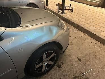 carolla disk: Toyota Corolla (E120) hatchback - Kuzov: 5 qapılı hatchback, gümüşü — 3
