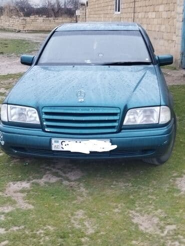 бампер на мерседес w210: Mercedes-Benz markalı, tünd firuzəyi rəngli sedan. Avtomobil rahat və — 9