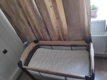 uwaq ucun manej: Bu, körpələr üçün nəzərdə tutulmuş, tünd qəhvəyi və bej rənglərdə olan — 6