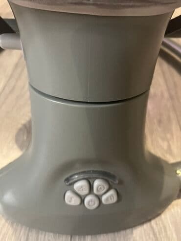 dinozavr yumşaq oyuncaqlar: Uşaqlar üçün nəzərdə tutulmuş, boz rəngli, yellənən beşik. Beşikdə — 3