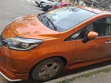 prada naocare: Nissan Note e-POWER, narıncı rəngli, şəhər üçün ideal hibrid (benzin — 5