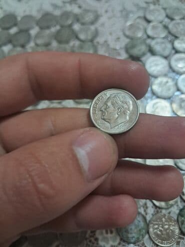 qizil onluq qiymeti: Məhsul: ABŞ sikkələri (centlər) Tərkib: - 1 sent sikkələri - 5 sent — 12