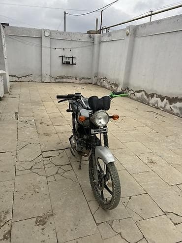 arxa suse: Sino M50 motosiklet - Mühərrik: 50 sm³, karbüratorlu, hava soyutmalı — 4