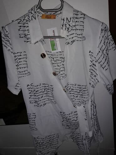 ağ koftalar: Kofta xanımlar üçün olan bu gözəl qısaqol kofta satılır. 38 razmerdir — 6