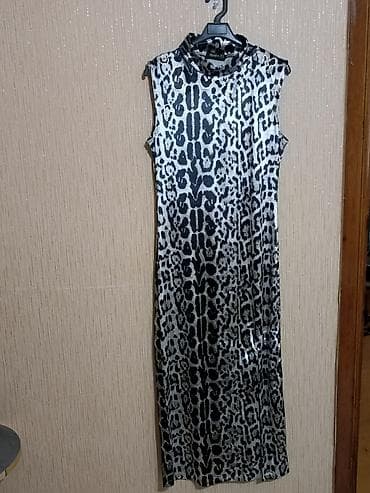 platye: Qadın paltarı – leopard naxışlı, boğazlı, qolsuz.1 dəfə geyinilib.Heç — 2
