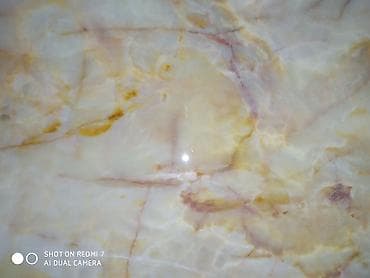 Oniks daşından ovala yaxın formada bədii lövhə/masaüstü plitə