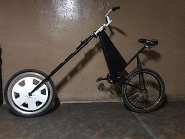 Fərqli dizayna malik, xüsusi hazırlanmış çopper velosiped. Uzun ön