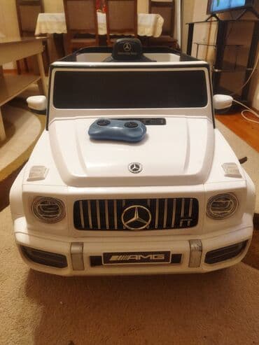 işlənmiş uşaq masinlari: Ağ rəngdə, Mercedes-Benz AMG G63 modelinə bənzər uşaq elektrik — 2