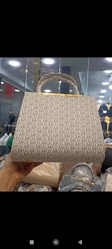 kurtka qadin ucun: Əl çantası — 13