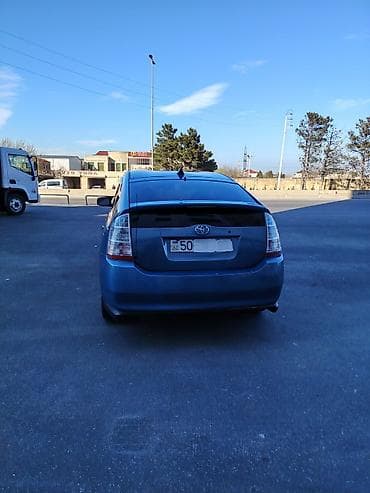 ford ehtiyat hisseleri: Toyota Prius (2-ci nəsil) hibrid hetçbek - Rəng: mavi - Salon: boz — 10