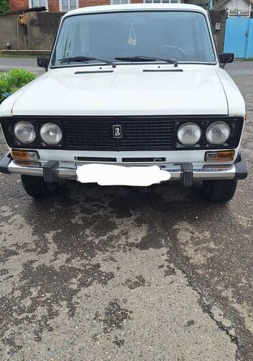 ваза стеклянная прозрачная высокая без узора: VAZ 2106 sedan - Korpus: Ağ rəng, 4 qapı, xrom ön-arka bamperlər — 1