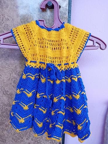 Əl işi uşaq paltarı – toxunma - Rənglər: parlaq sarı və mavi