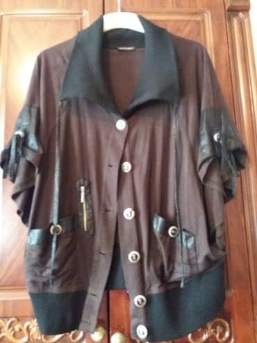 1 defe geyinilib xarincden alinib