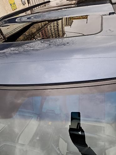 4 qapi niva: Land Rover Discovery 3 – tünd mavi rəng, tam ölçülü SUV. Əsas — 5