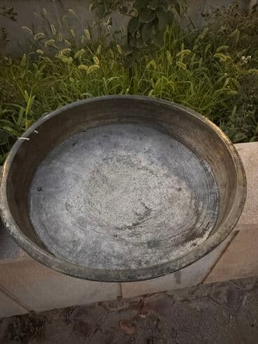 metbex krantlari: Qədimi mis tas — 1