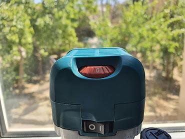 mini drel satilir: Makita RT0701CX7 elektrik əl frezeri – 2 baza və aksesuarlarla — 4