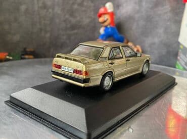metbex tavan modelleri: Коллекционная модель Mercedes-Benz 190E 2.3 16V W201 gold 1984 EDICOLA — 6